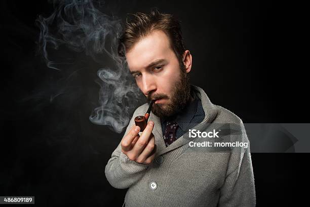 young-man-smoking-a-pipe.jpg