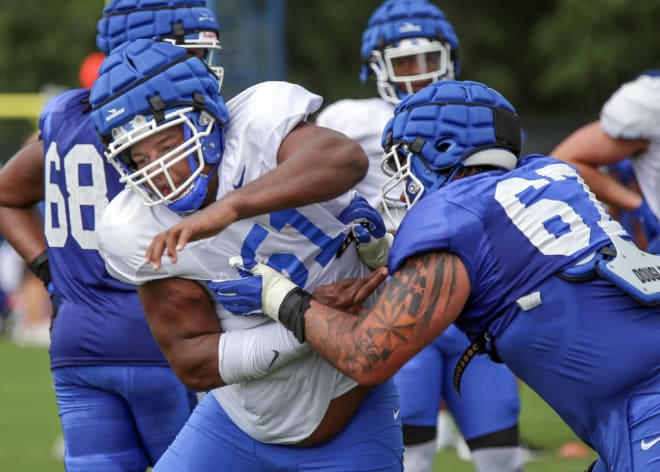 Freshman defensive tackle Deone Walker (51) has been the talk of camp thus far on Brad White's unit.