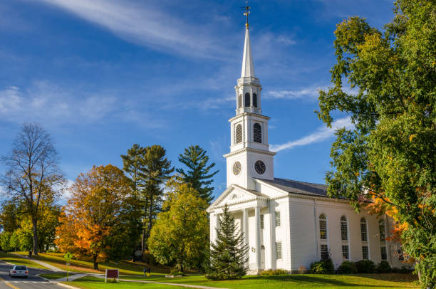 traditional-american-white-church-and-blue-sky-picture-id821257904
