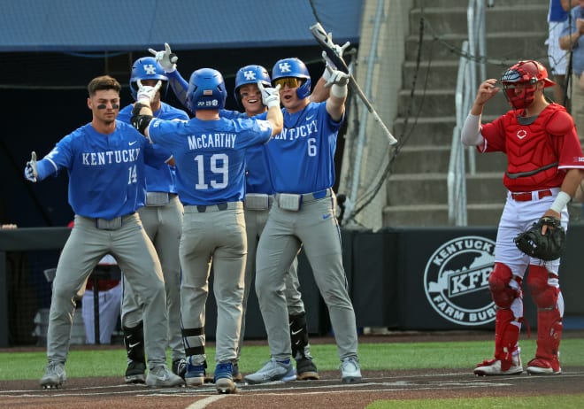 Nolan McCarthy's Kentucky teammates greeted him at home plate after his three-run homer in Sunday's 