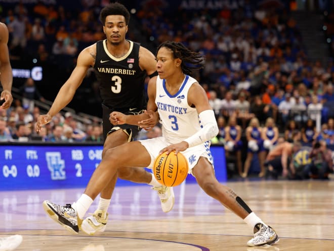 Kentucky's TyTy Washington drove past Vanderbilt defender Rodney Chatman on Friday in the SEC Tournament quarterfinals. 