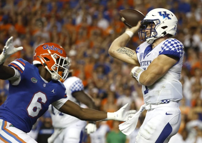 Kentucky quarterback Will Levis threw under pressure from a Florida defender during Saturday's game in Gainesville.