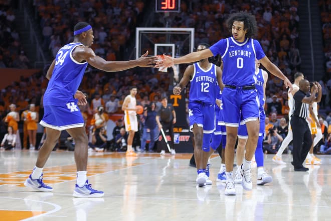 Kentucky's Oscar Tshiebwe congratulated teammate Jacob Toppin after a play in Saturday's game at Thompson-Boling Arena in Knoxville. 