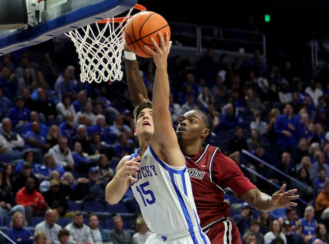 Kentucky freshman guard Reed Sheppard drove to the basket during Monday's season opener at Rupp Arena.