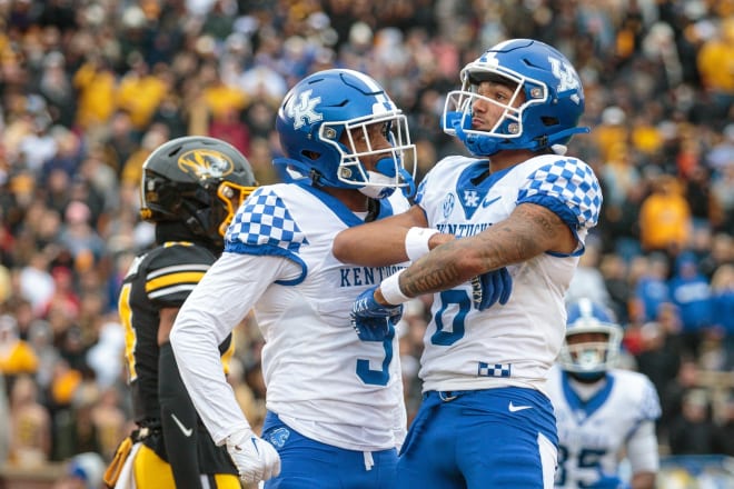 Kentucky's Tayvion Robinson (left) celebrated with fellow receiver Dane Key after a touchdown for the Wildcats.