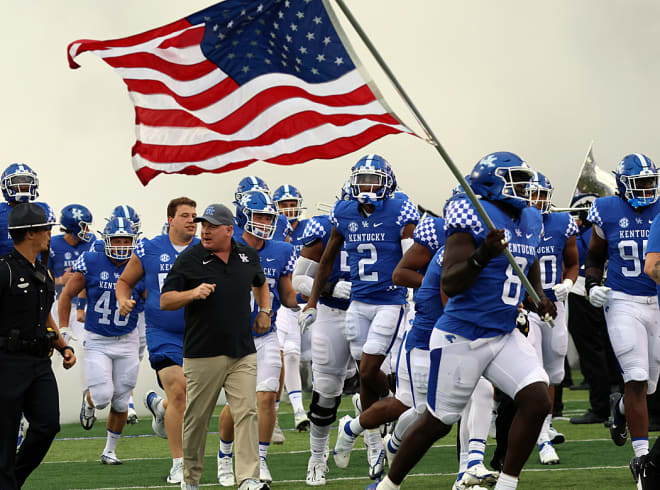 Kentucky head coach Mark Stoops led the Wildcats onto the field during a game from the 2022 season.