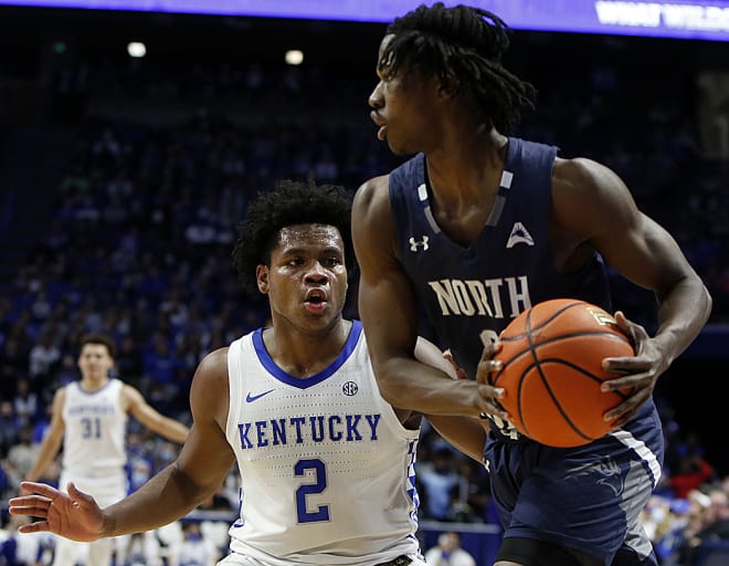 Kentucky's Sahvir Wheeler put pressure on the UNF ballhandler during Friday's game at Rupp Arena.