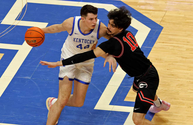 Freshman center/forward Zvonimir Ivisic worked his way around Georgia defender RJ Sunahara during Saturday's game at Rupp Arena. It marked Ivisic's first appearance in a game for UK after being declared eligible by the NCAA.