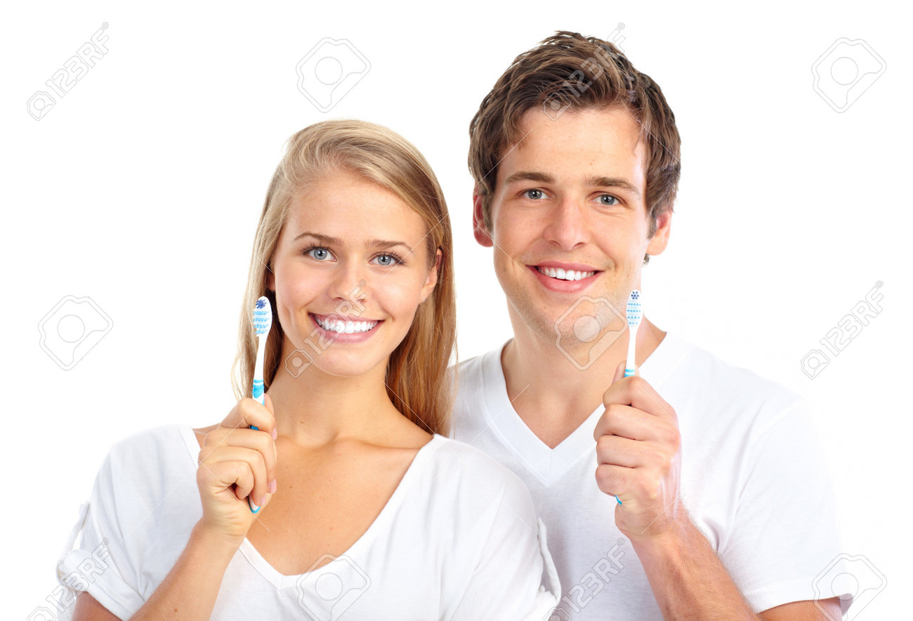 7465770-Happy-young-couple-with-toothbrushes-Healthy-teeth-Isolated-over-white-background--Stock-Photo.jpg