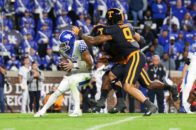 Kentucky quarterback Will Levis was sacked by a pair of Volunteer defenders during Saturday's game at Neyland Stadium in Knoxville.