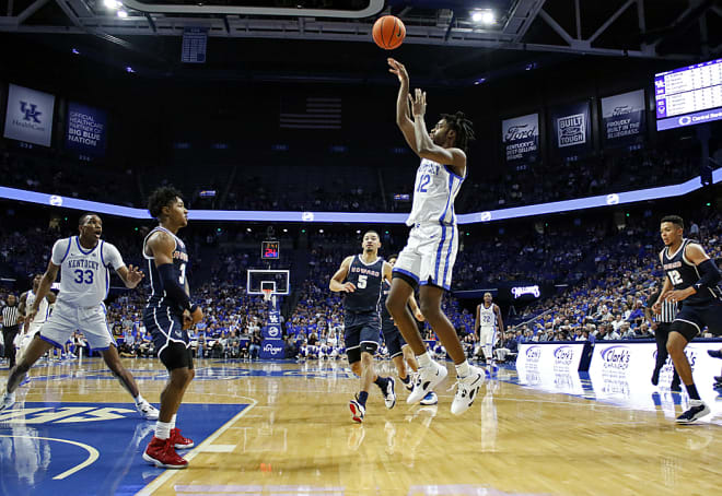 Kentucky guard Antonio Reeves shot a floater on the baseline during Monday's season opener against Howard.