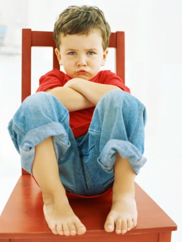 boy-pouting-sitting-chair-359px.jpg