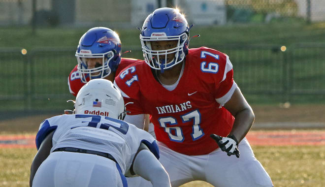 Madison Central's Malachi Wood took on a Lexington Christian defender in the season opener for both teams on Friday night in Richmond..