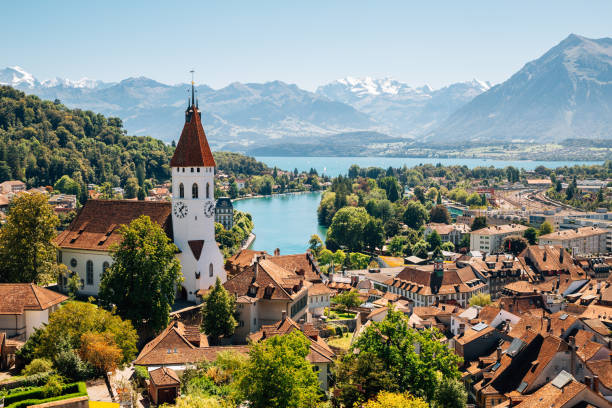 thun-cityspace-with-alps-mountain-and-lake-in-switzerland-picture-id945092130