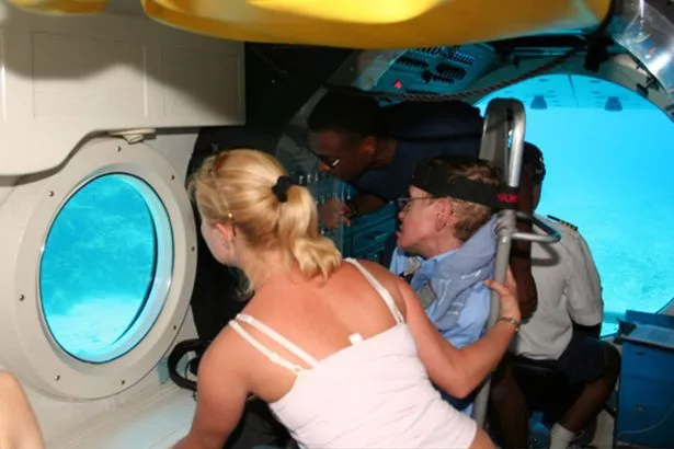 PAY-Stephen-Hawking-enjoys-a-sea-bed-tour-on-a-submarine-off-Jeffrey-Epsteins-Caribbean-island-Little-St-James.jpg