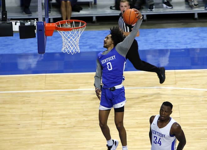 Kentucky forward Jacob Toppin soared for a windmill dunk on the fast break.