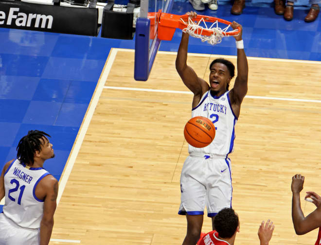 Antonio Reeves finished off a lob pass from DJ Wagner in the second half of the Wildcats' 96-70 win over Illinois State on Friday night at Rupp Arena.