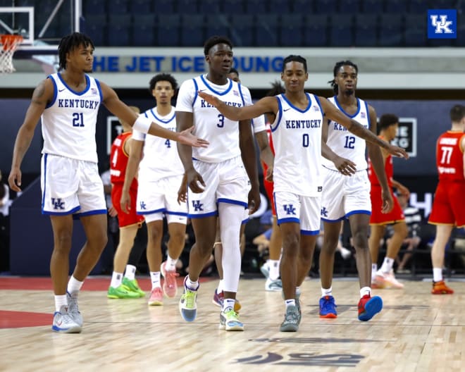 Kentucky freshmen DJ Wagner and Rob Dillingham exchanged congratulations after coming off the court for a timeout on Wednesday in their GLOBL Jam game against Germany.