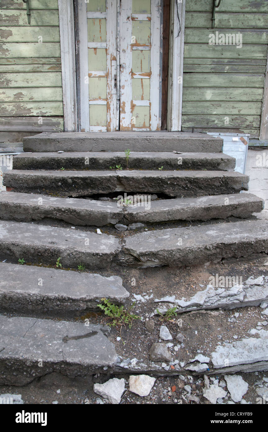 broken-staircase-leading-up-to-a-dilapidated-wooden-building-tallinn-CRYFB9.jpg