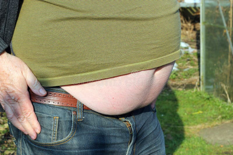 overweight-obese-man-fat-belly-protruding-hanging-over-his-belt-40352660.jpg